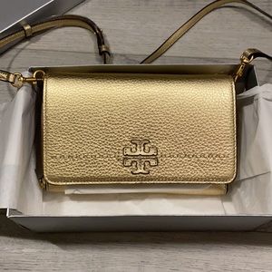 McGraw Metallic Flat Wallet Cross-Body in gold.